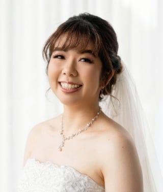 51-Classic-bridal-chignon-hairstyle-smooth-and-timeless-for-Asian-brides