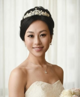 69-Soft-romantic-updo-with-slight-texture-for-a-modern-Asian-bride